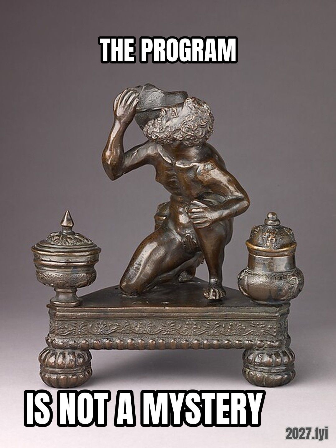 A bronze inkwell of Atlas carrying the globe. THE PROGRAM / IS NOT A MYSTERY